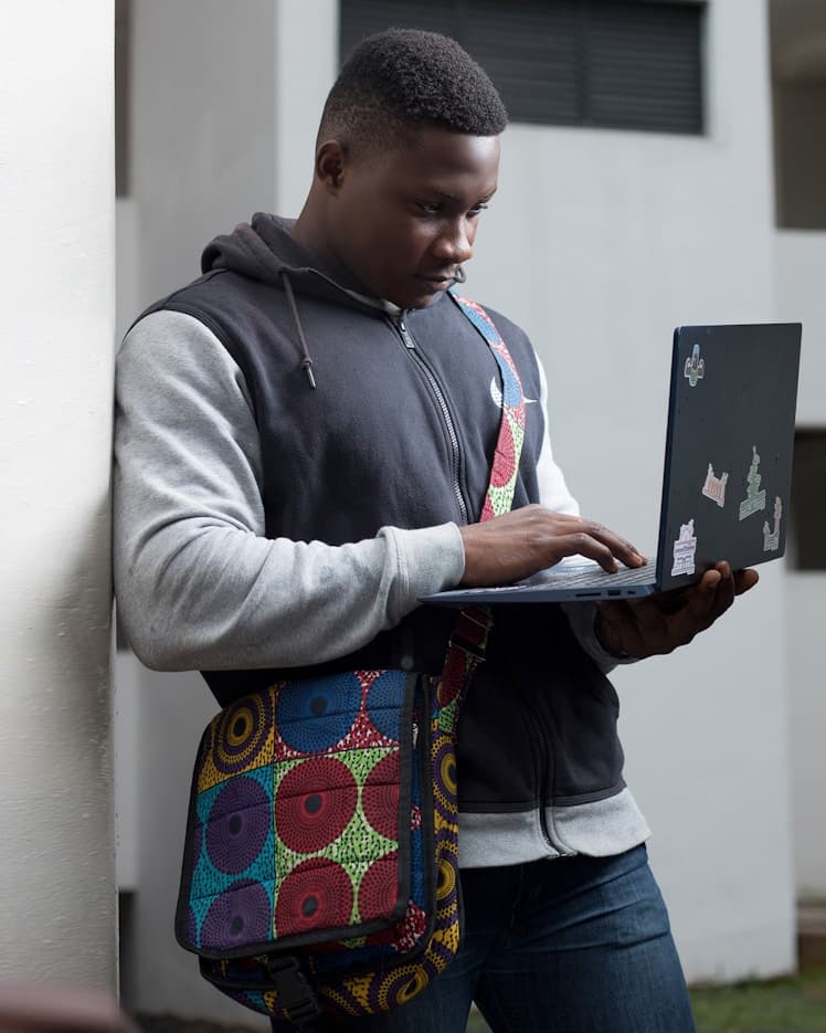Young person using a laptop